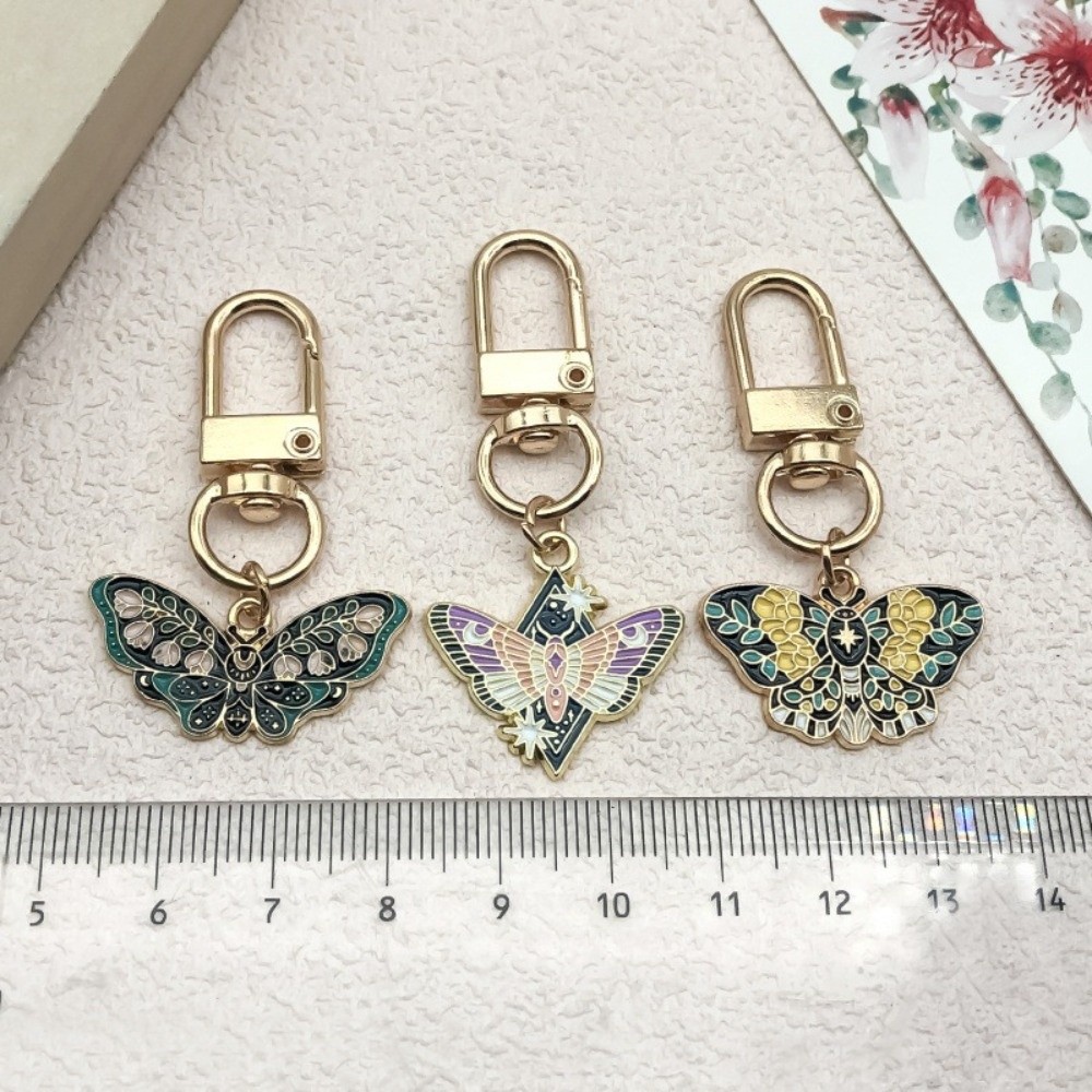 Porte-clés Papillon Coloré Éma - Butterfly Rubber Sheet avis et prix